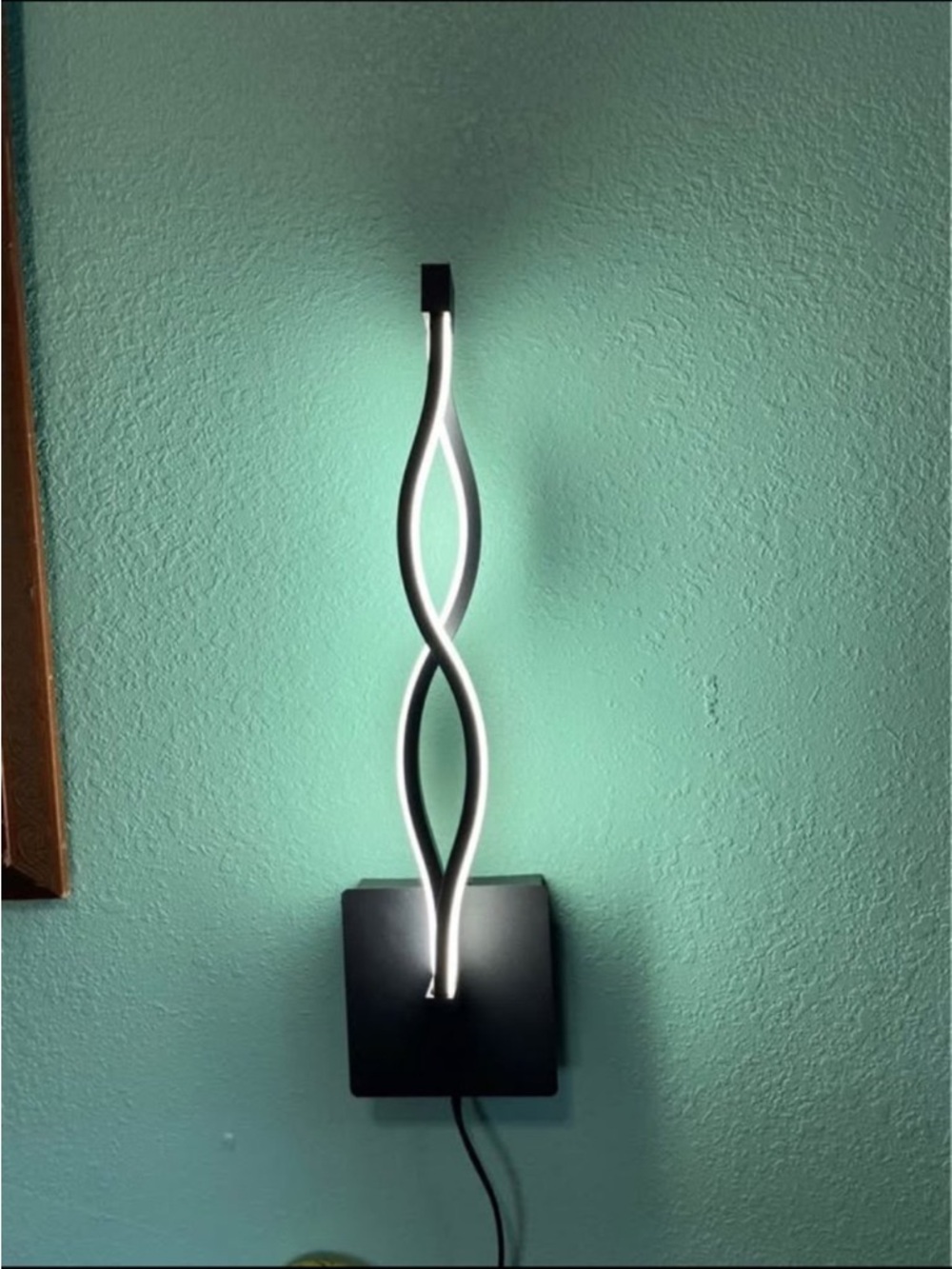 Modern Black LED Wall Sconce - Twisted Ribbon Design